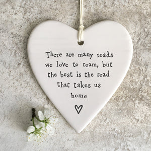 East of India Hanging Porcelain Heart with a meaningful quotes; ' There are many roads we like to roam, but the best is the road that takes us home' 4210