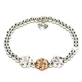 Silver plated bracelet with three flower charms 