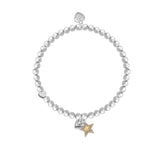 silver plated elastic beaded bracelet with dangly gold sparkly star charm
