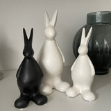 Stylish all white bunnies with a matte finish  perfect for spring