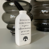 White Ceramic Mini Bud Vase 9cm with quote; 'Families are like branches on a tree, they grow in different directions yet our roots remain as one'