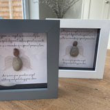 Mini Framed Pebble Art - White & Grey block square frame 12.5cm 'A feather from an angel is one we rarely see but this one is quite different and as special as can be. This feather is a reminder of a special person's love , who is now your guardian angel watching and protecting from above'The pebble angel with the wings in a soft background with a white feather loose inside the frame making this a beautiful gift