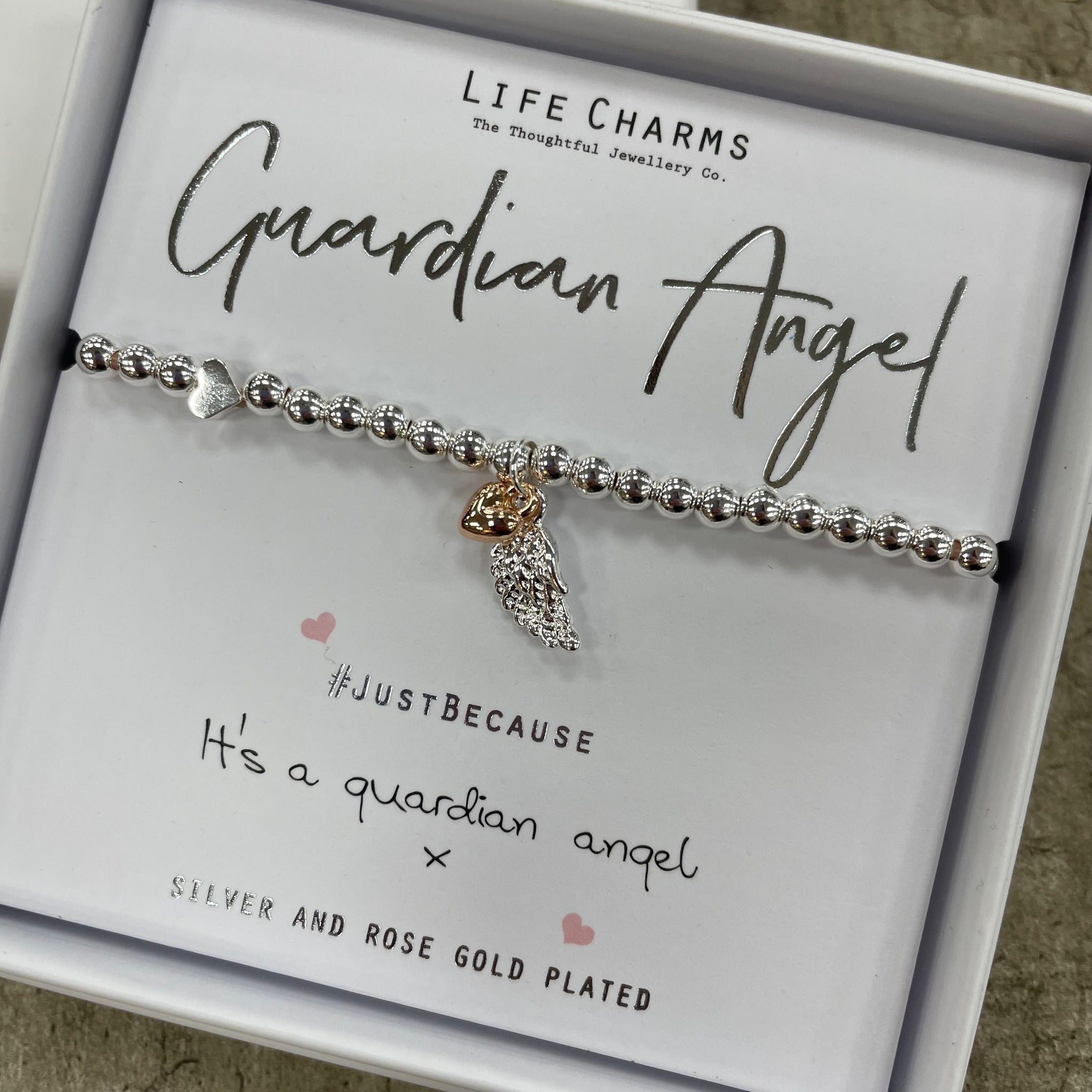 Angel feather bracelet on sale