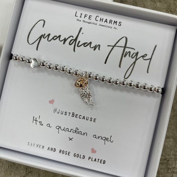 Life charms silver bracelet with silver feather charm & gold heart - reads 