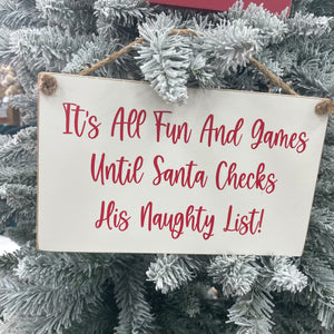 The Giggle Gift Co christmas signs - Its all fun and games until santa checks his naughty list!