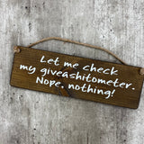 Wooden Hanging Sign - "Let me check my giveashitometer..."