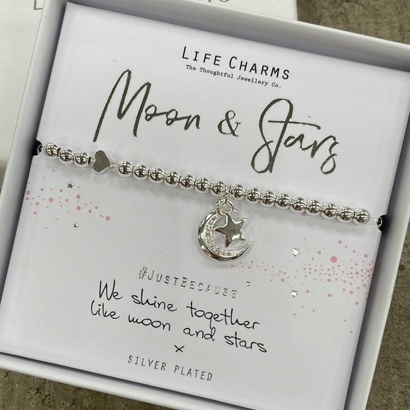 Life Charms Silver Plated Bracelet with dangly moon & star charms - reads 