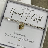 Life Charms Silver Bracelet with puffed gold heart charm reads "Heart Of Gold #justbecause you have a heart of gold"