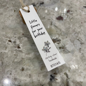 Sweet flower shaped stud earrings presented in a message bottle on a card that reads "little flowers for your birthday"  Sterling Silver