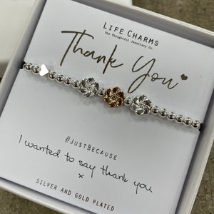 Life CharmSilver Bracelet with three flower charms - reads "Thank you #justbecause I wanted to say thank you x"