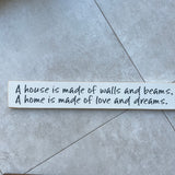 Long Wooden Hanging Sign - 'A house is made of walls & beams..'