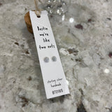 Sweet nut shaped stud earrings presented in a message bottle on a card that reads "bestie, we're like two nuts"  Sterling Silver (also available in gold)