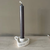 Ceramic Heart shaped Candlestick Holder with loving quote: 'Sometimes love is all you need' with tapered candle
