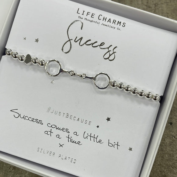 Life Charm Silver Bracelet with chained rings charm - reads 
