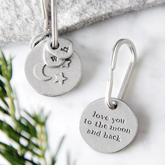 The sweetest sentimental keyring with raised moon and stars on the front and the phrase “love you to the moon and back” stamped on the back.