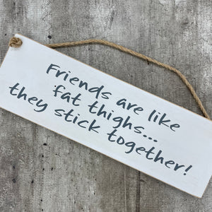 Made in the UK by Giggle Gift Co. Wooden L29.5cm Hanging Sign " Friends are like fat thighs... they stick together!"