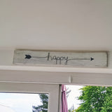 Long Whitewashed Sign with wire word "happy"