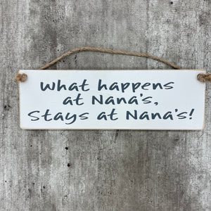 The Giggle Gift Co - Made in the UK Wooden Hanging Sign L29.5cm "What happens at Nana's stays at Nana's!"