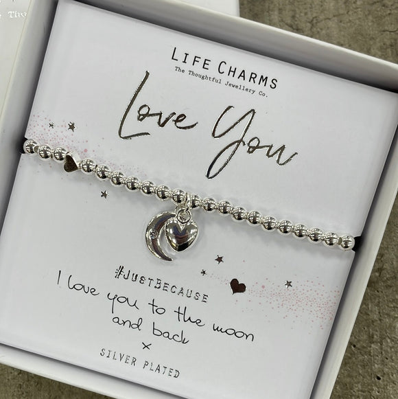 Life Charms Silver Bracelet with Moon & Puffed Heart Dangly Charms reads 