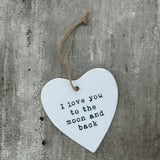 White ceramic hanging heart 10cm with a loving quote; 'I love you to the moon and back'