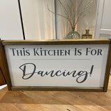Made in the UK by Giggle Gift Co Rectangular L63.5cm Framed Plaque with white vinyl; "This Kitchen is for dancing!"