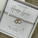 Life Charms Silver Bracelet with stirrups charms in gold & silver - reads "Horse Lover #justbecause Life is better at the stables x"