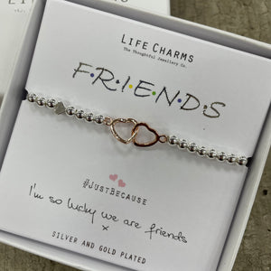 Life charm silver bracelet with intertwining rose gold hearts - "F.R.I.E.N.D.S #justbecause I am so lucky we are friends x"