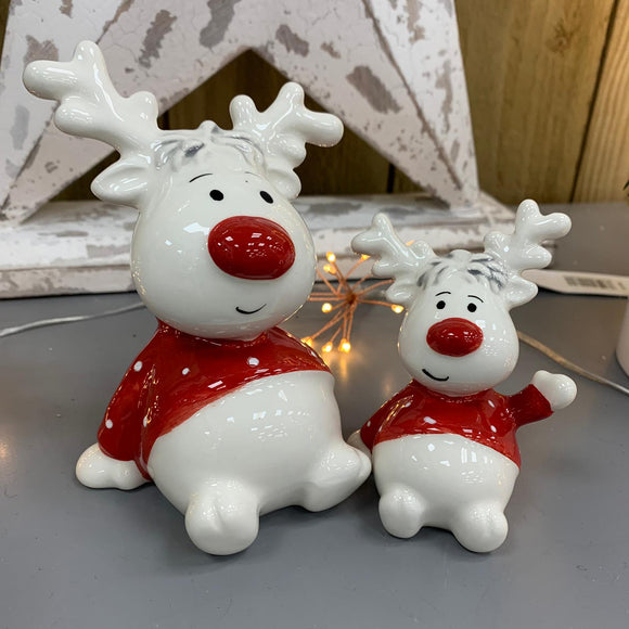 Cute ceramic sitting reindeers wearing a red spot sweater in small & large - D
