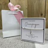 Champagne Life Charms Bracelet in it's gift box (included) with matching Life charms gift bag (sold separately for £2)