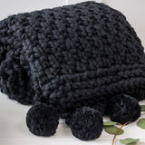 Retreat - Black Knit Cushion with Pom Poms